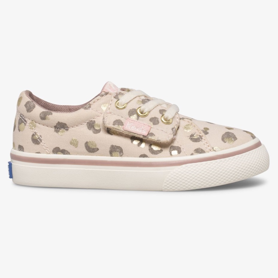 Küçük çocuğun Atlama Vuruşu Jr Keds Leopar
